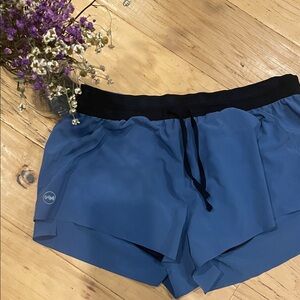 Janji Women's Athletic Shorts in Blue and Black